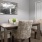a dining room table with chairs