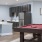 a kitchen with a table and chairs