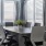a table with chairs and a clock
