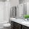a bathroom with a tub sink and toilet